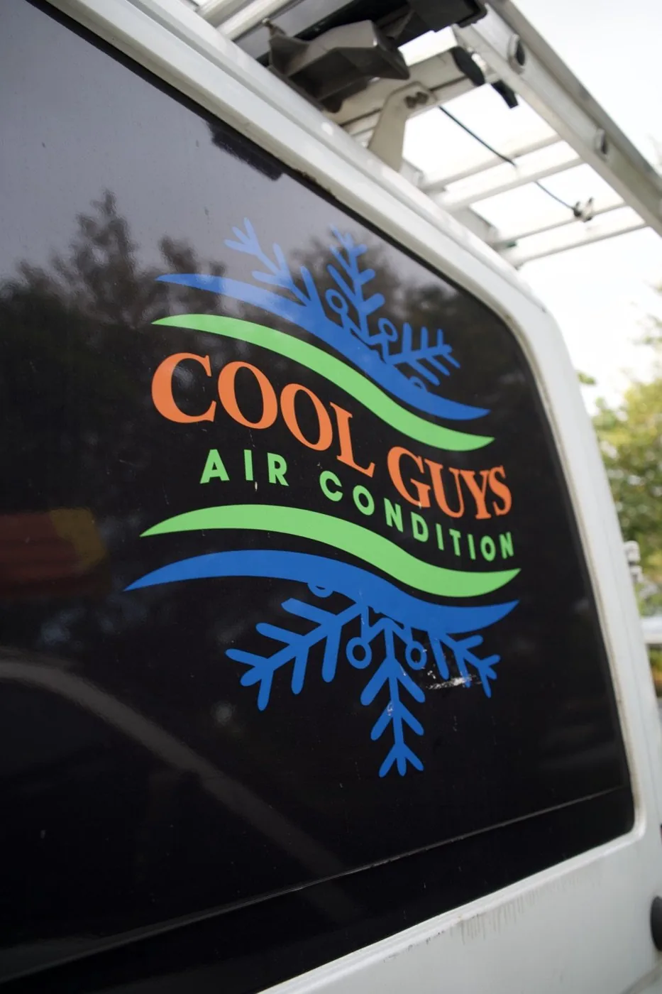 Cool Guys Air Condition logo wrap on a service van, photographed by Optic Vault Marketing