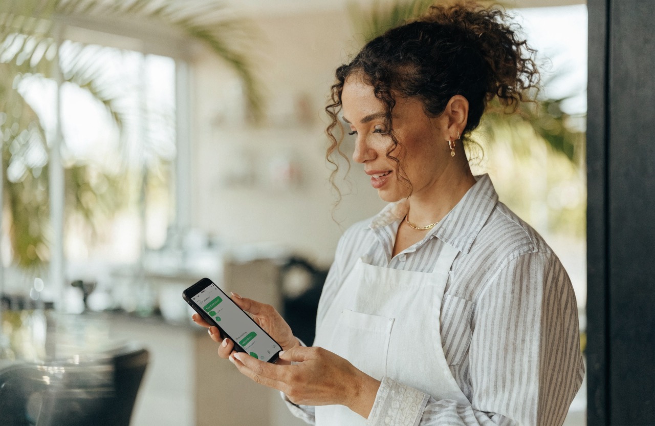 Never miss a call again business owner texting back a missed caller from a Miami salon