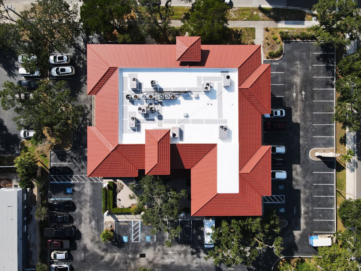 Completed 3 Squares Roofing tile and flat roof job — drone view, South Florida